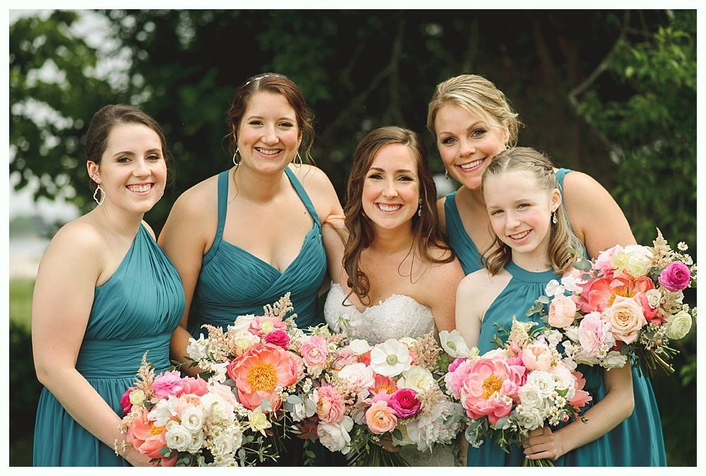 Three-panel grayscale photo of a man in a light suit adjusting his cufflinks, smiling, and looking out a window.