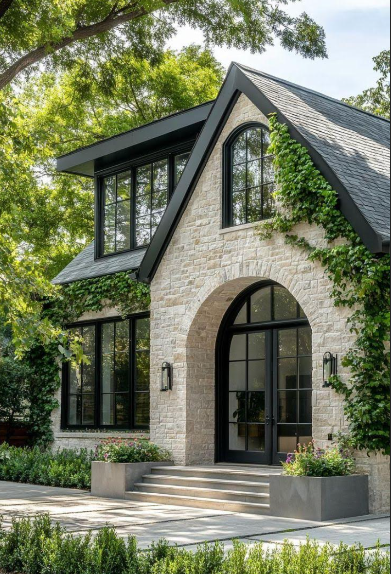 Person cleaning a window with a blue and yellow squeegee; city skyline in the background.