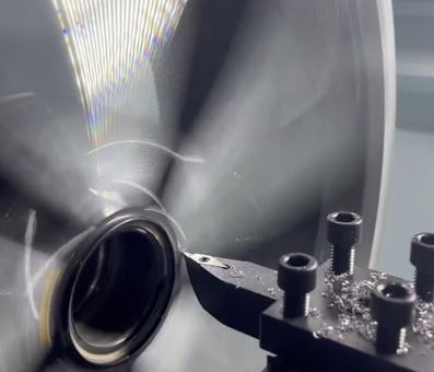 A machine is cutting a wheel in a factory - Canvey Island Essex