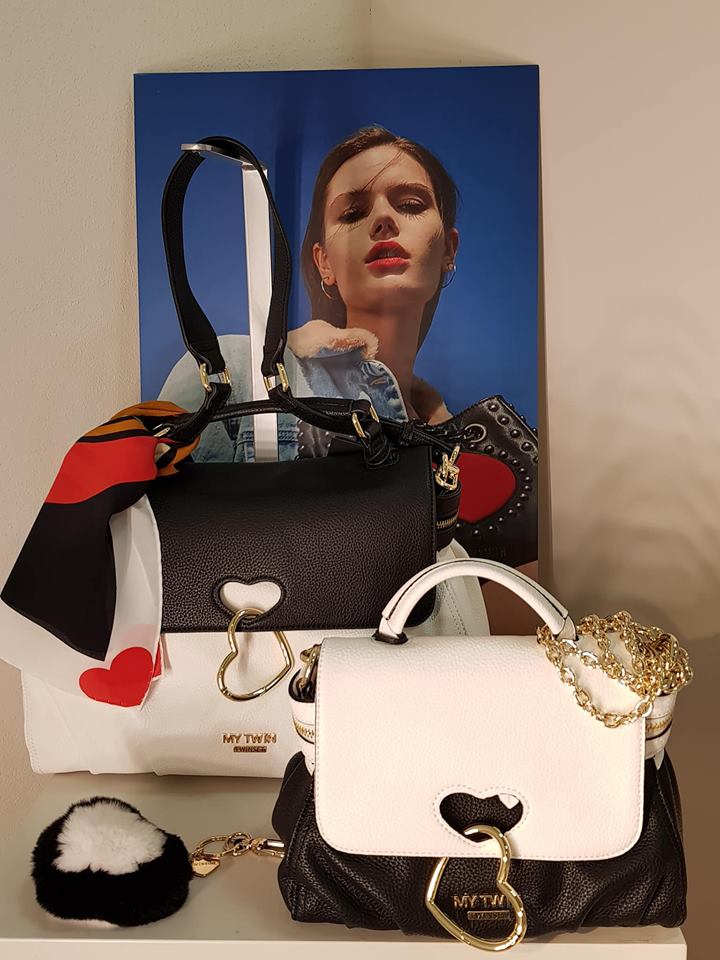 Borse in pelle bianca e nera