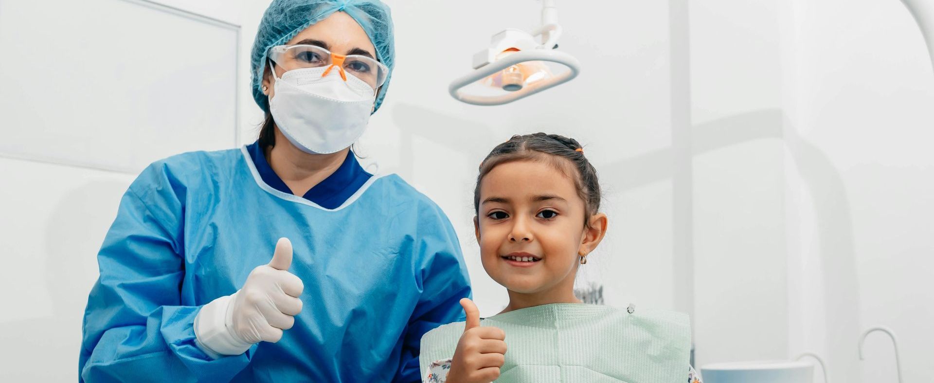 child smiling at the dentist 