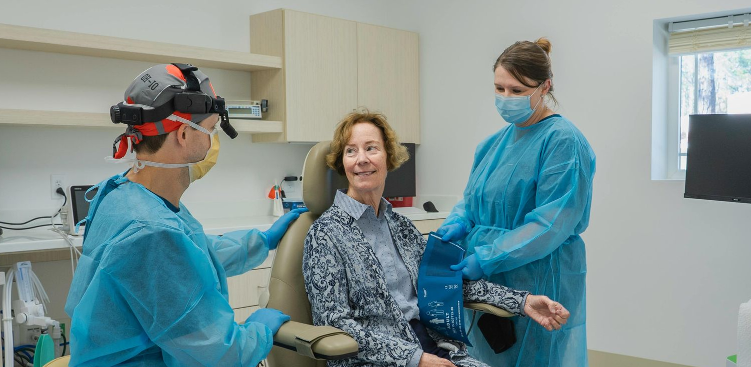 woman sitting at a dentist chair 