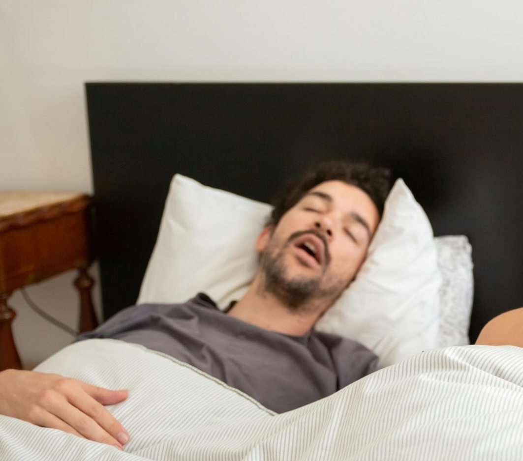 Man sleeping with his mouth open