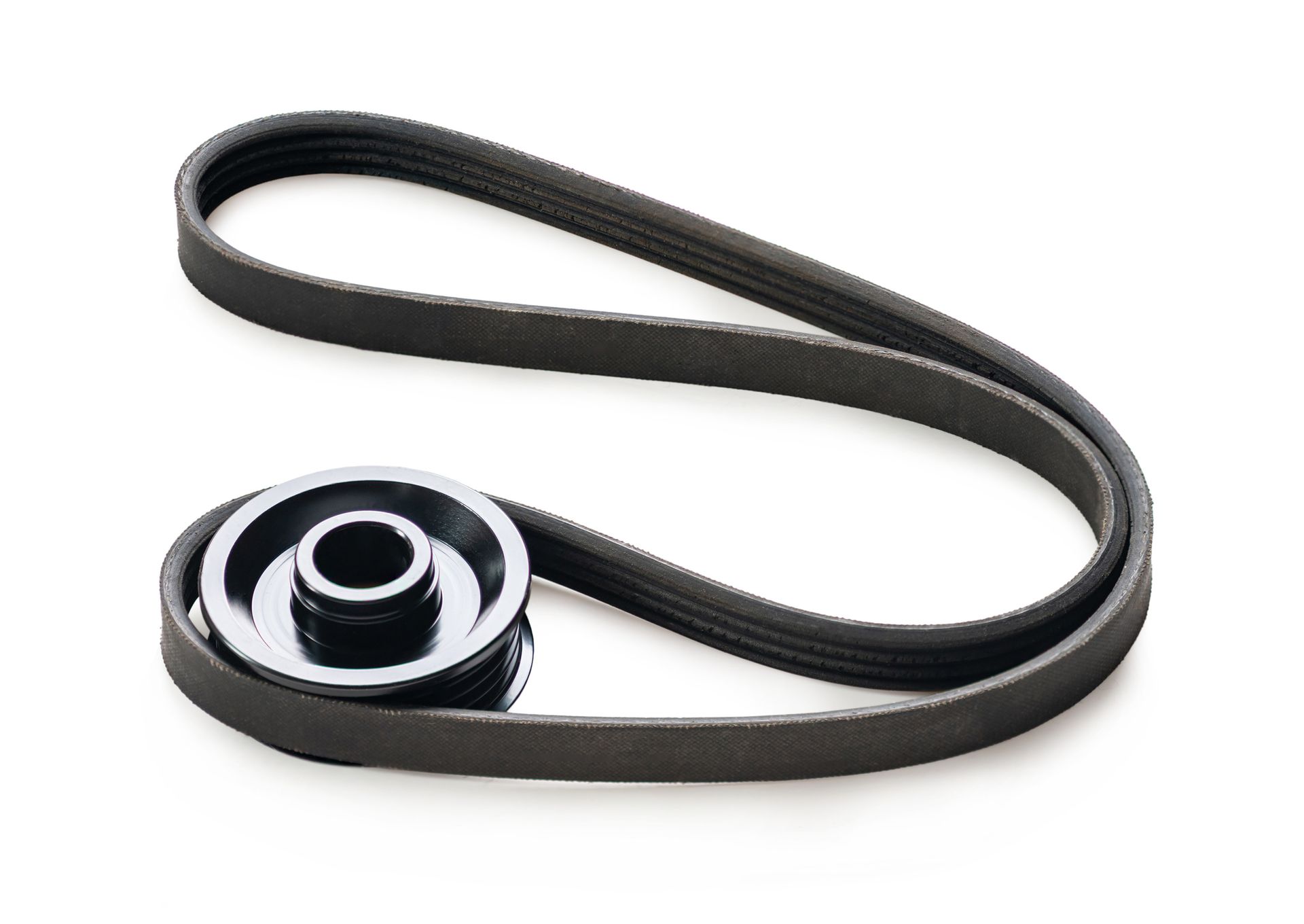 Serpentine belt and pulley on a white background. Black belt with grooves wraps around a silver pulley.