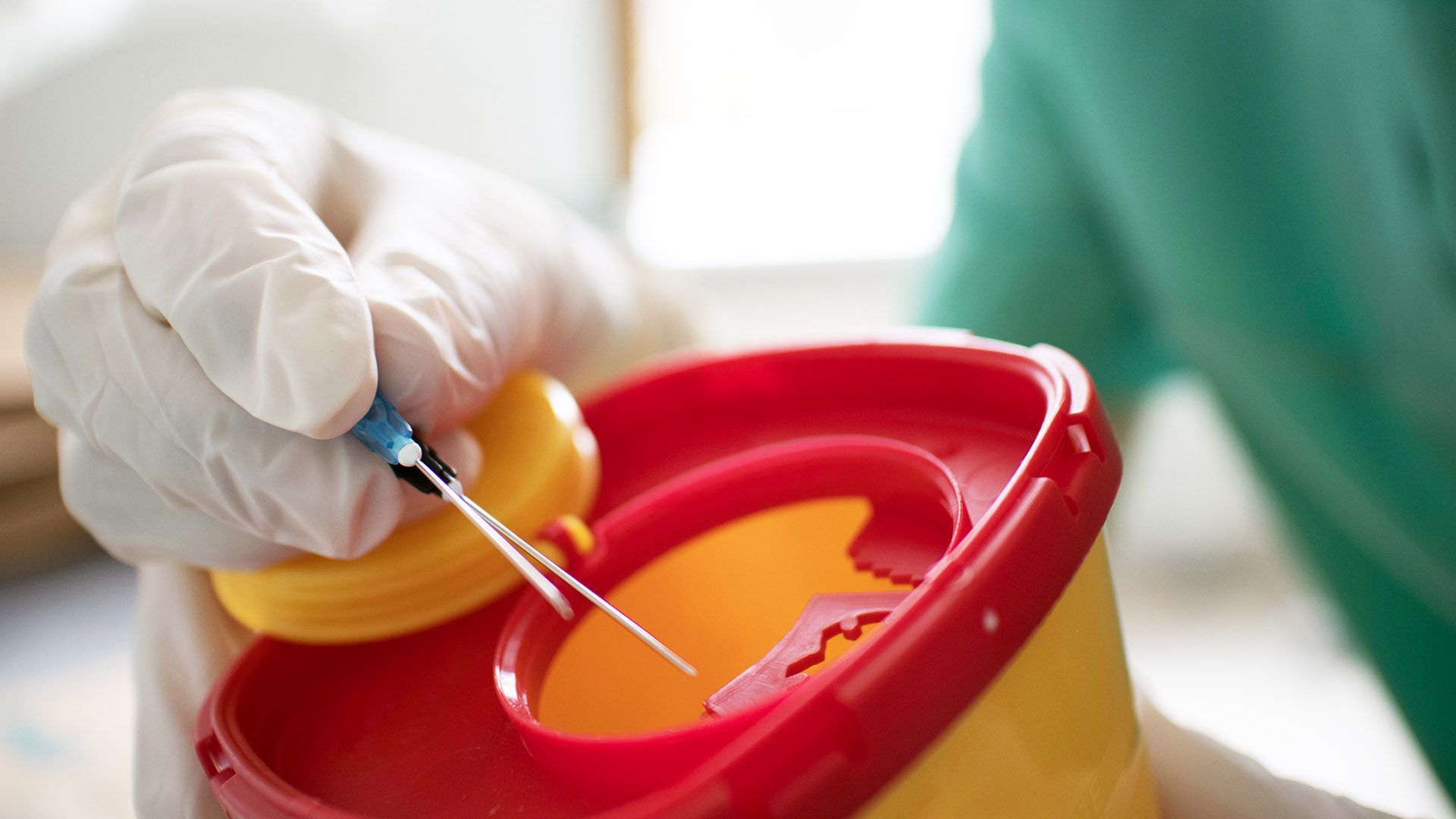 Disposing of medical sharps in a sharps container