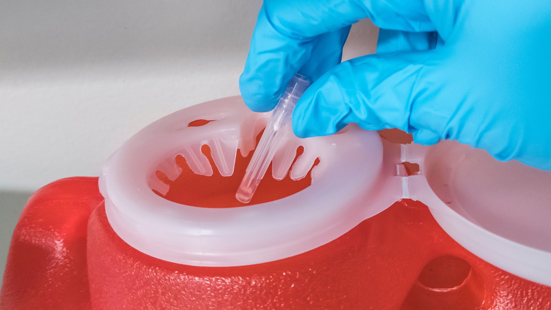 red sharps container