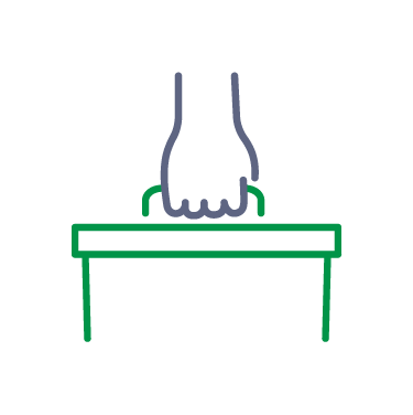 Hand gripping a green and blue vaulting table.