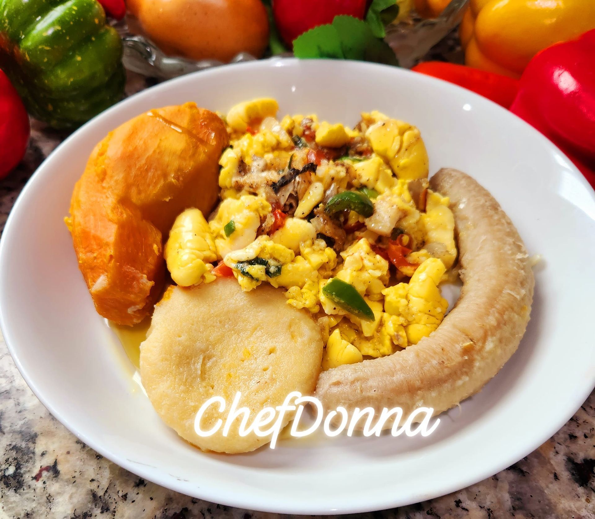 The flag of jamaica is painted on a grunge background.