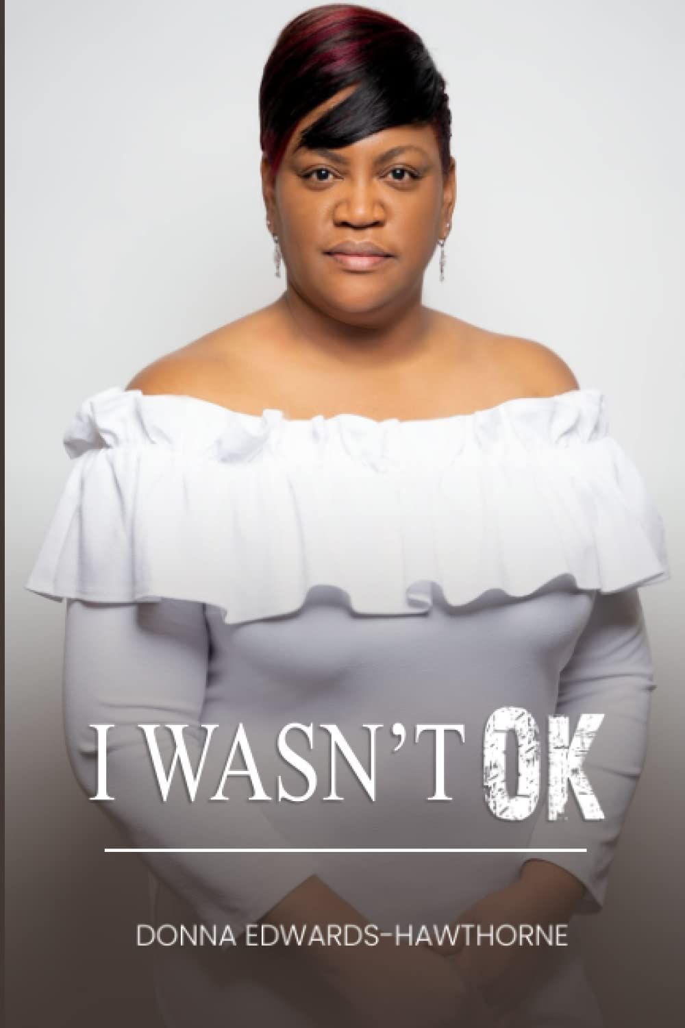 A woman is on the cover of a book titled i wasn 't ok