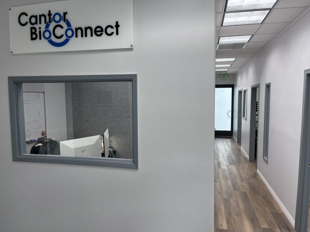 A hallway with a cantor bioconnect sign on the wall