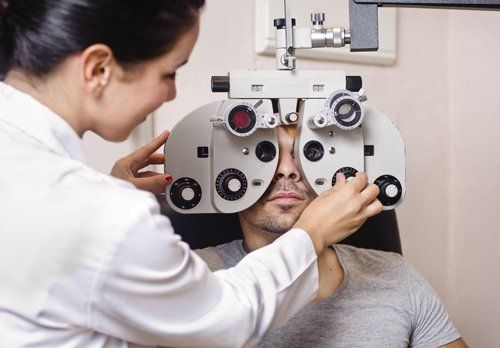 Optometrist examining the eye