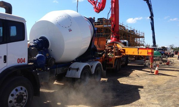 a concrete mixer truck with the number 004 on it