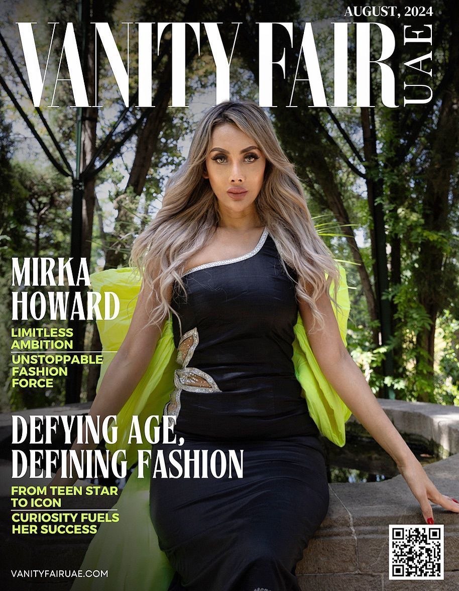 Vanity Fair UAE cover: Mirka Howard in black dress, yellow shawl, posing outdoors. 
