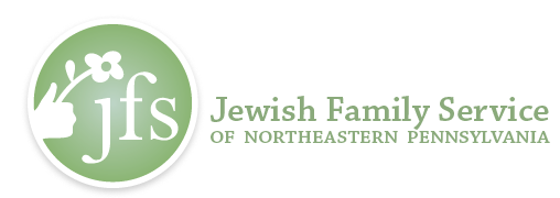 Jewish Family Service of Northeastern Pennsylvania logo. Green circle with "jfs" and flower design.