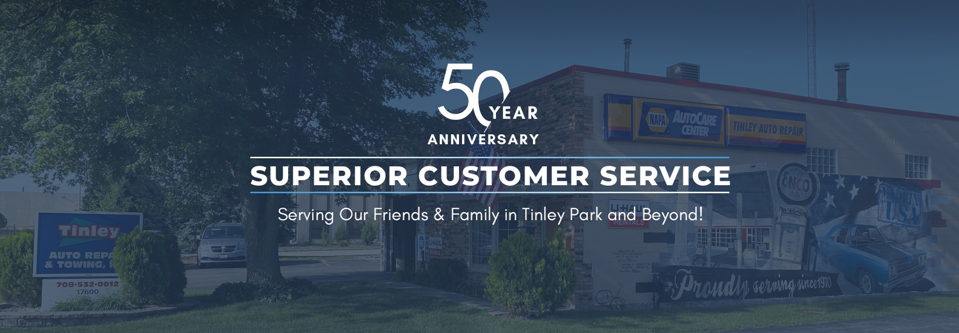 Blue 50th anniversary banner reading “Superior Customer Service” over a road scene | Tinley Auto Repair & Towing Inc