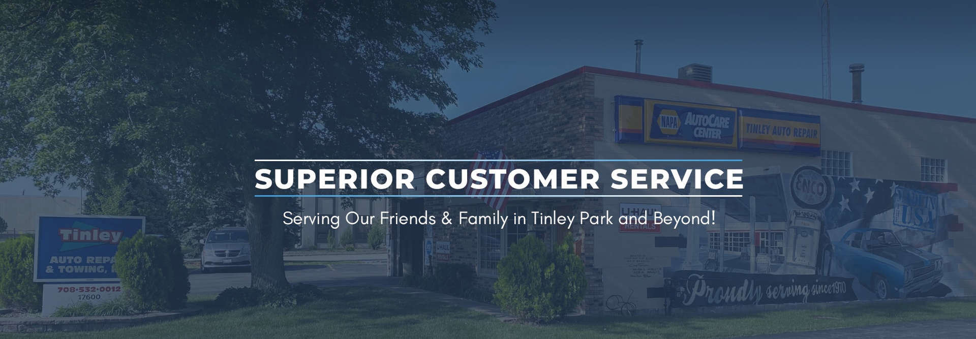 Blue 50th anniversary banner reading “Superior Customer Service” over a road scene | Tinley Auto Repair & Towing Inc