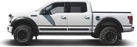 White pickup truck with black off-road trim, shown in side profile on a white background | Tinley Auto Repair & Towing Inc
