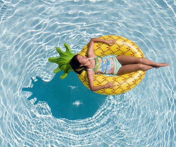 Woman On A Pool Floater — Sparks, NV — Dan Loose Pools And Spas