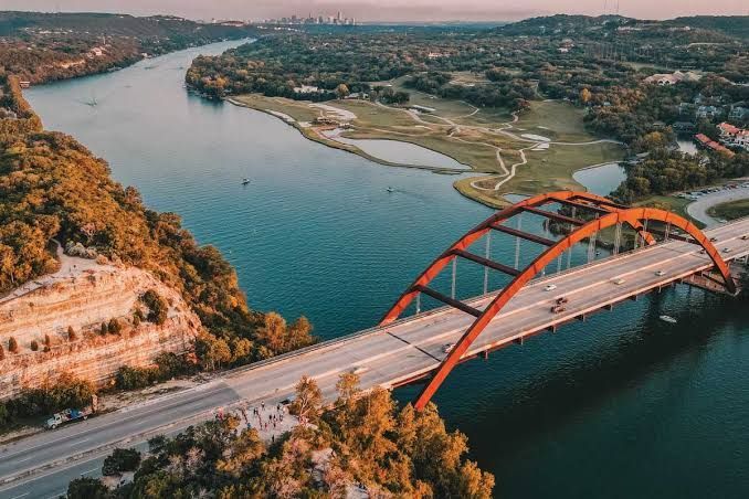 An aerial view of a bridge over a river.