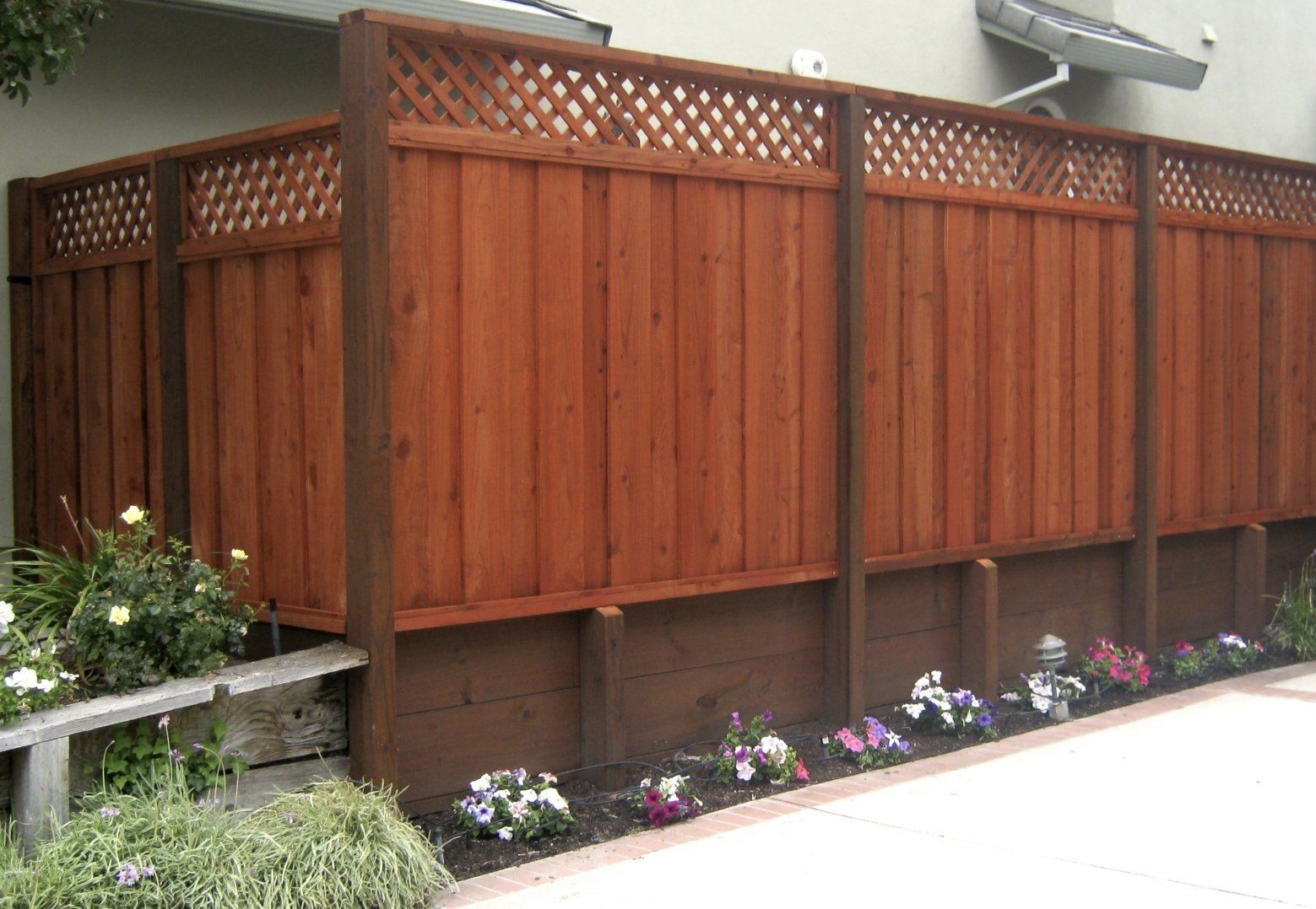 Custom design of redwood fences Martinez CA