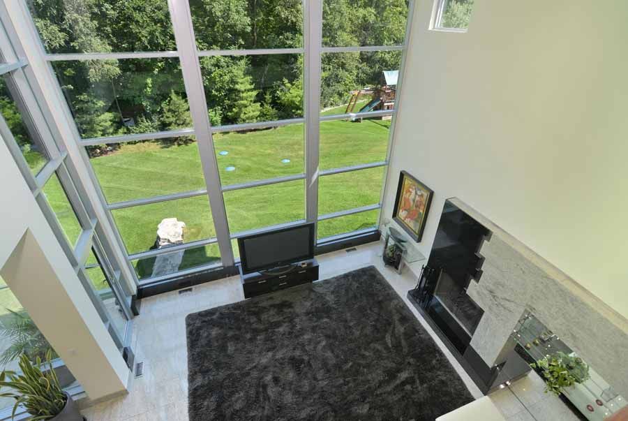 An aerial view of a living room with a large window