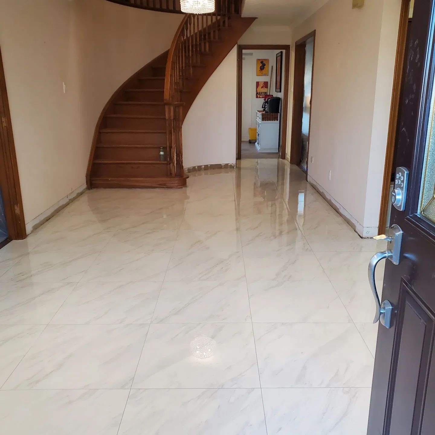 There is a spiral staircase in the middle of the room.