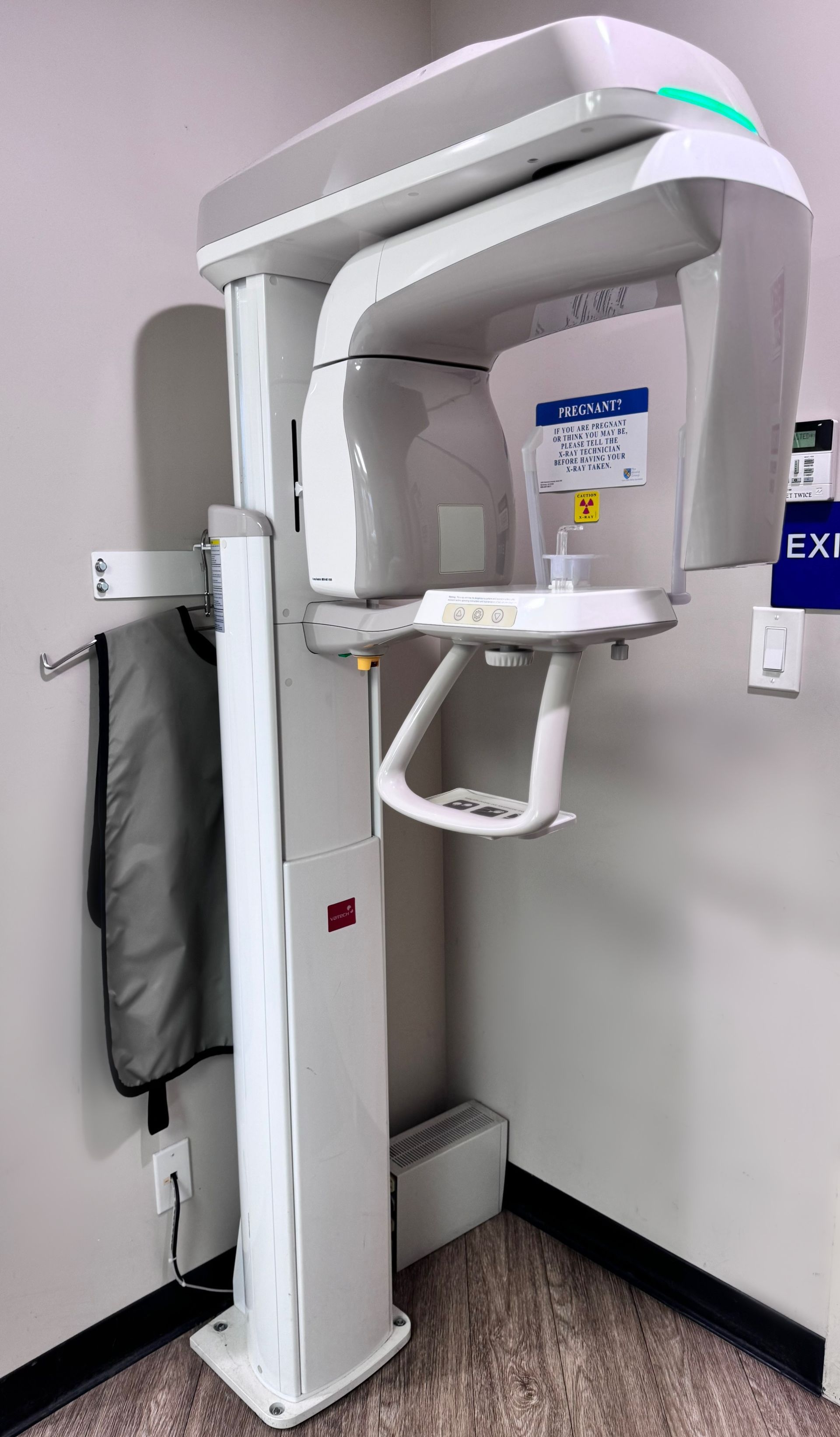 Panoramic X-ray (PANO)  provides a wide view of the entire  oral cavity  including  areas not visible  in the regular x-ray.