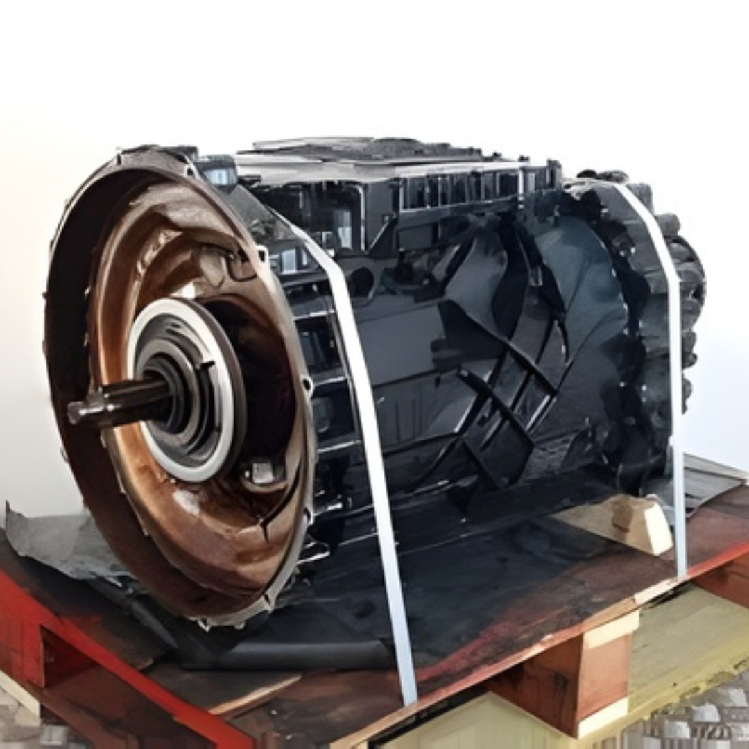 Rebuilt ZF TraXon gearbox unit strapped for transport with visible torque converter and housing.