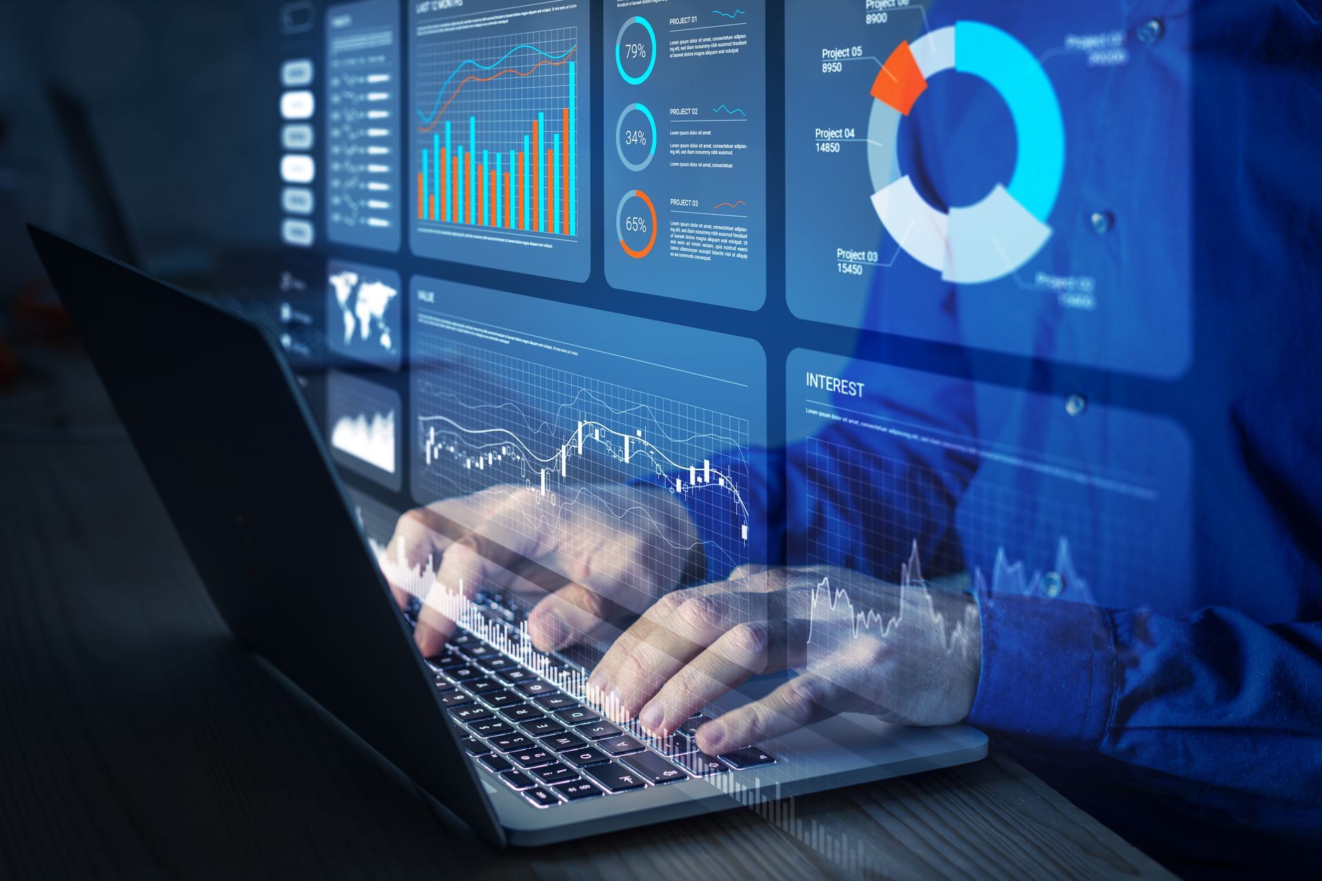 A person is typing on a laptop computer with a lot of graphs on the screen.