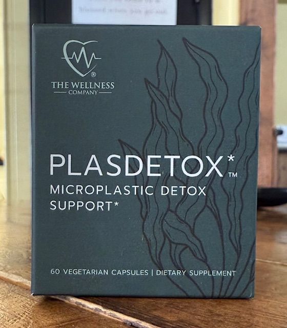 Box of Plasdetox capsules, dark teal, with seaweed illustration. Contains microplastic detox support.