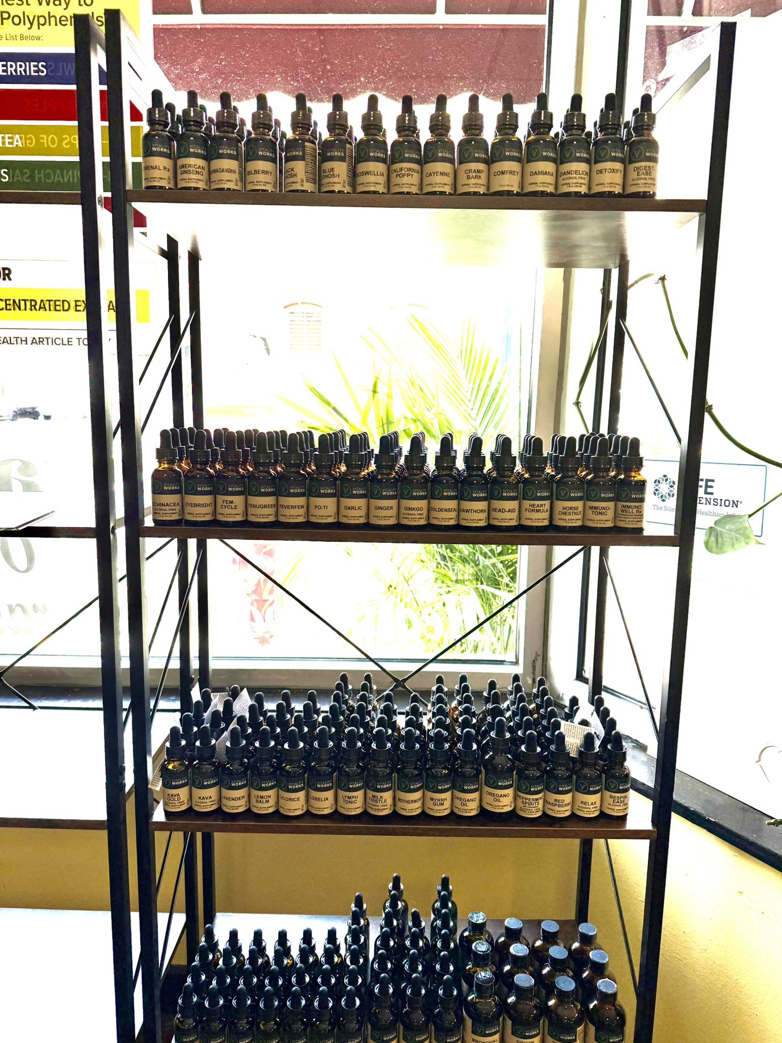Shelves filled with brown bottles, organized and on display, possibly for sale in a store.