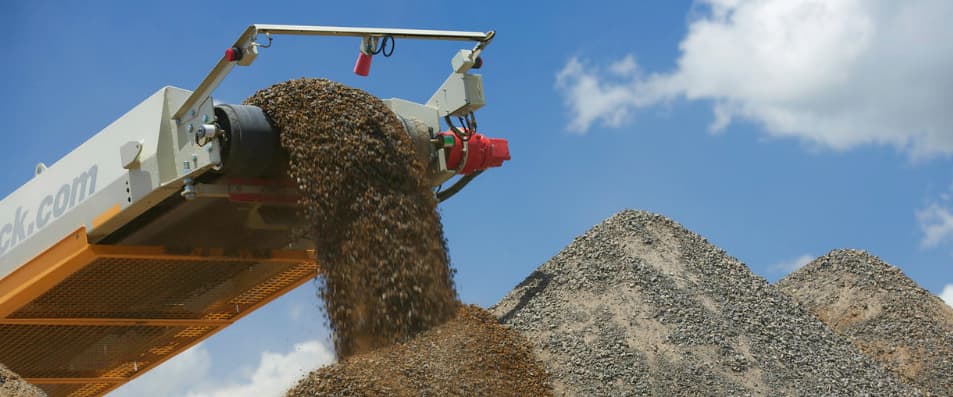 Gravel Being Moved By Machine — Quarry Products In Moranbah, QLD