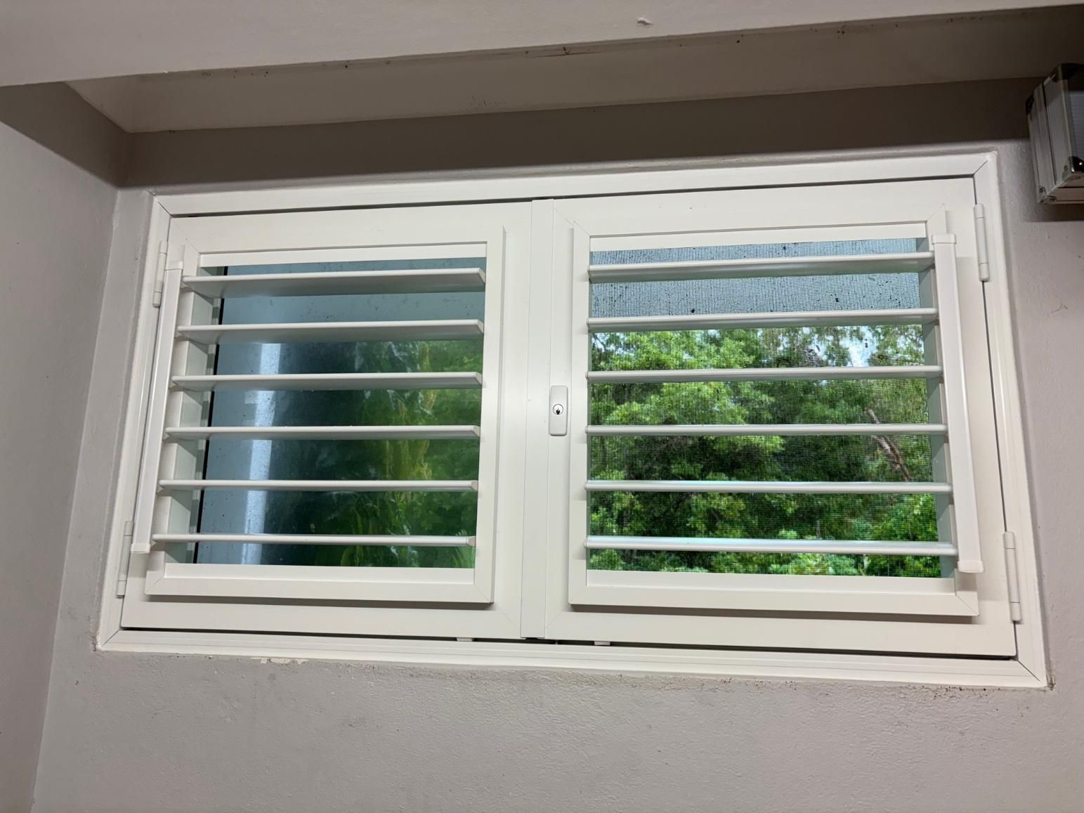 White-framed Window With Adjustable Horizontal Slats — A1 Security Screens Cairns In Edmonton, QLD