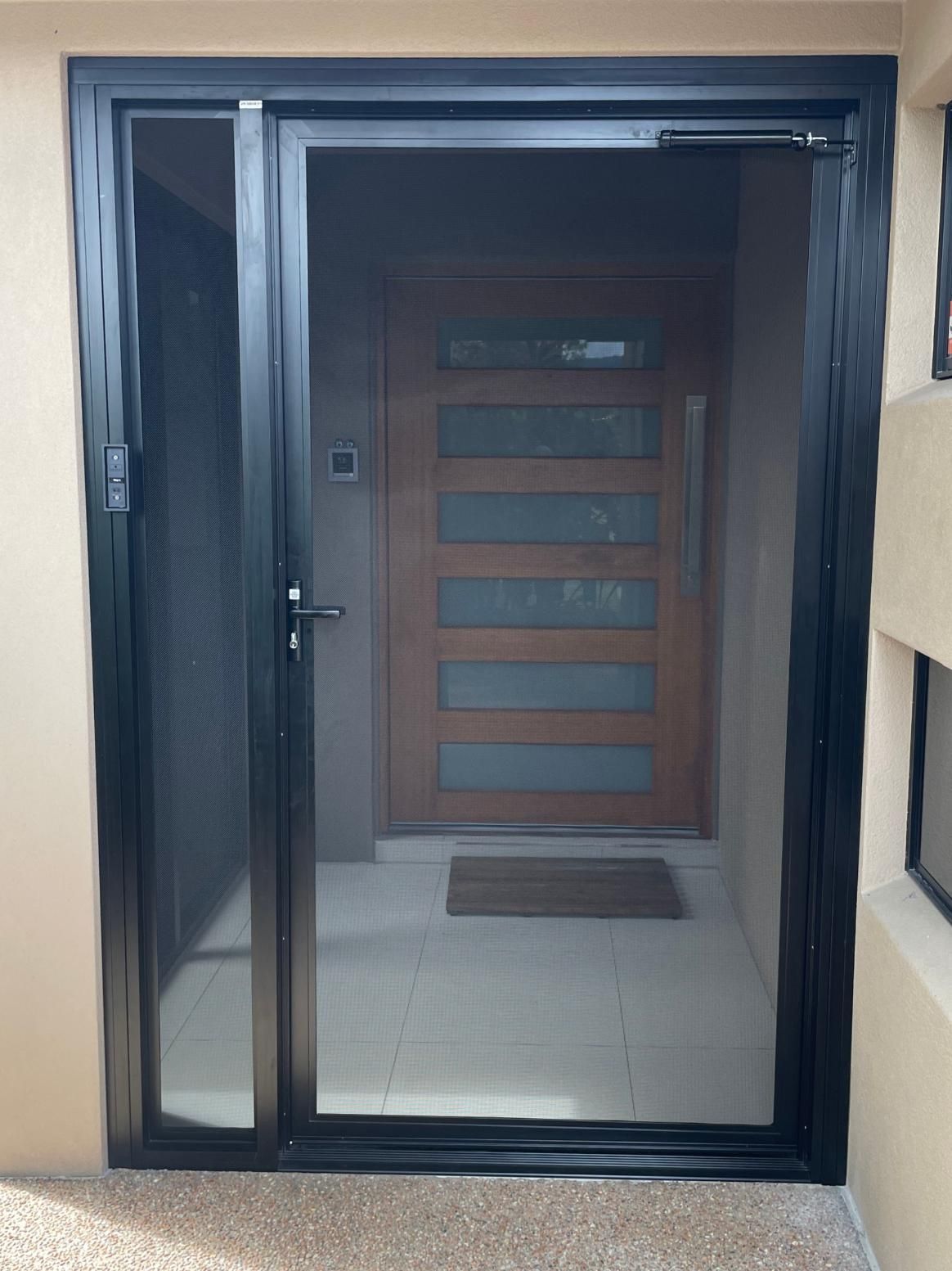 A Dog is Sitting at a Table on a Patio With a Ceiling Fan — A1 Security Screens Cairns In Manunda, QLD