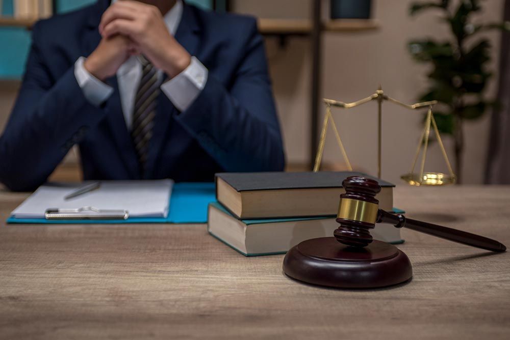 Scales of justice, legal documents on a desk, Gavel and law book in front of lawyer, legal system, c