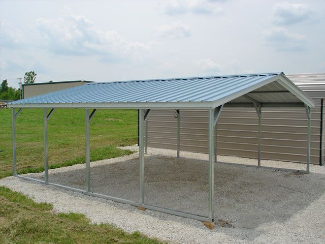 A metal carport with a white roof and black trim on a white background.