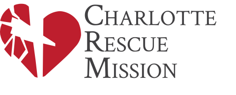 Logo for Charlotte Rescue Mission: Red heart, cracked, beside text.
