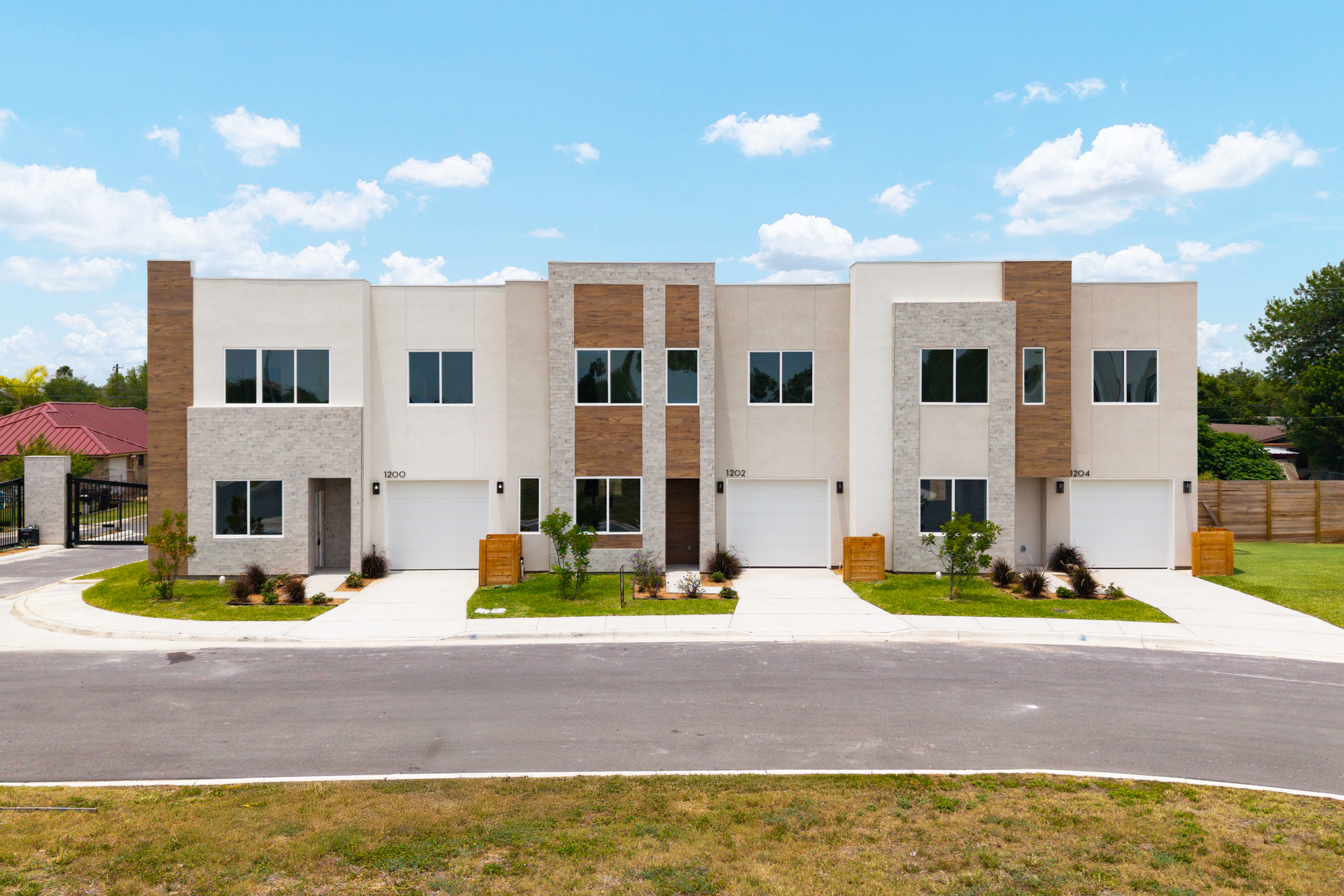 An artist 's impression of a kitchen and dining room in a house.