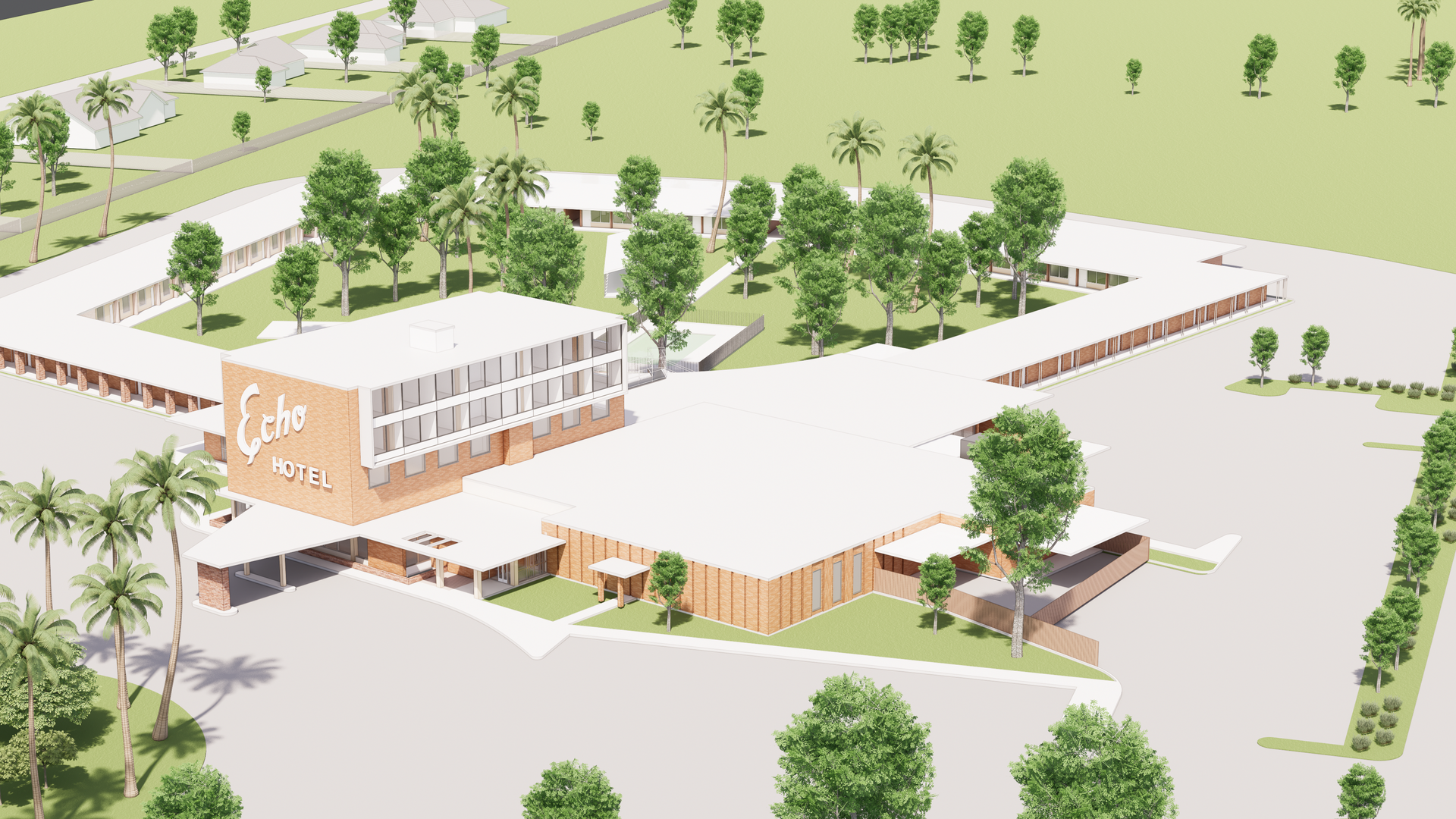 An aerial view of a large building surrounded by trees.