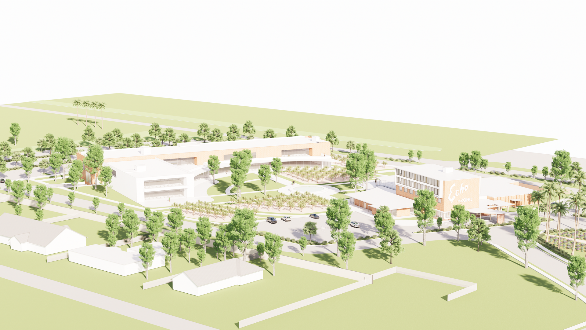 An aerial view of a large building in the middle of a field surrounded by trees.