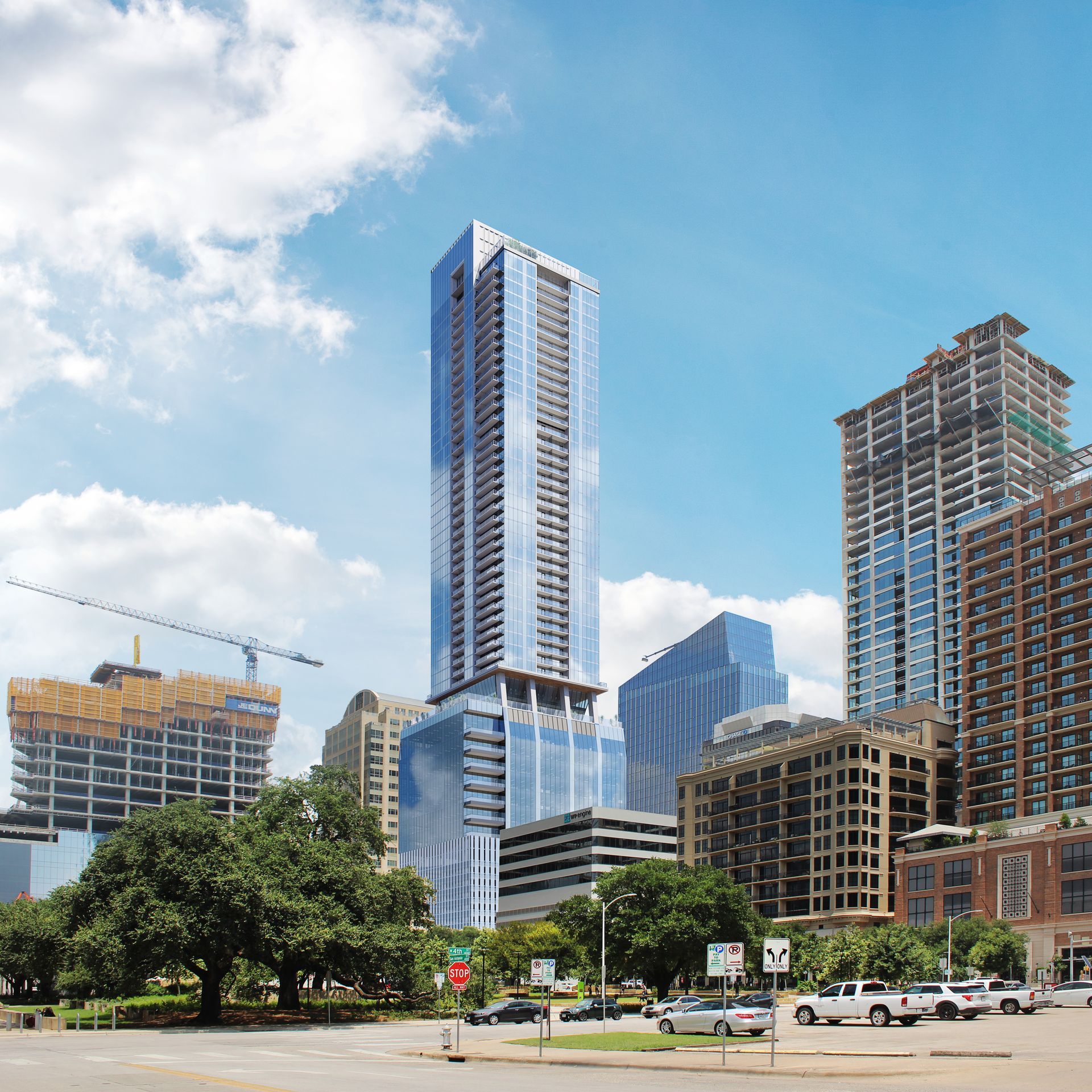 A very tall building in the middle of a city