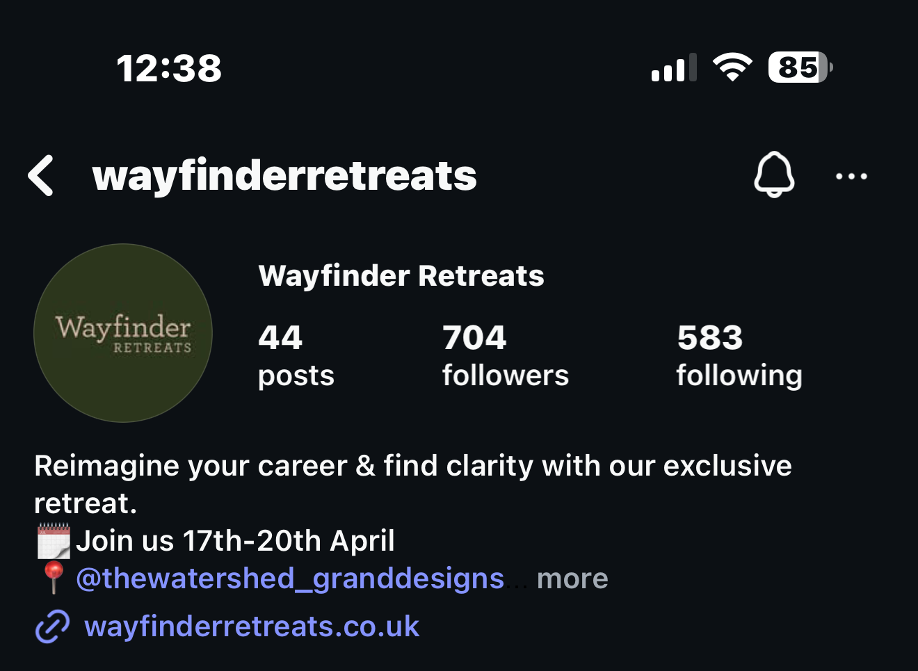 A phone screen shows the wayfinder retreats page