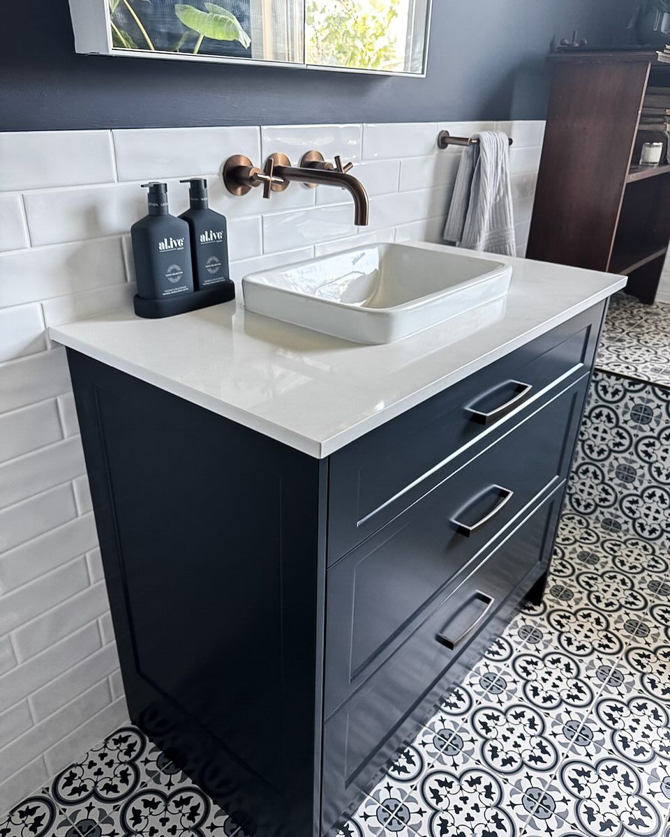 A Bathroom Vanity With a Sink and a Mirror — Kreuzer Cabinets In East Wagga Wagga, NSW