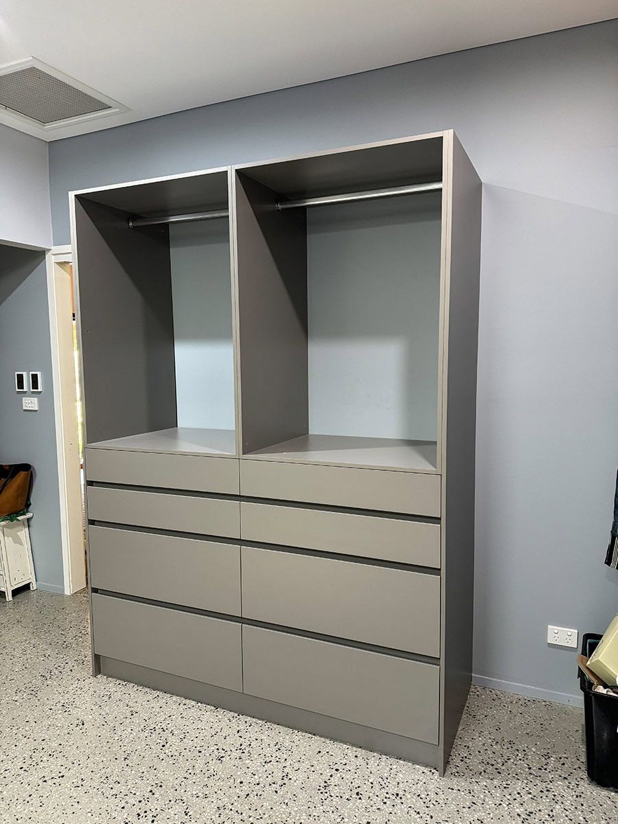 A Large Gray Wardrobe With Drawers And Shelves In A Bedroom — Kreuzer Cabinets In East Wagga Wagga, NSW