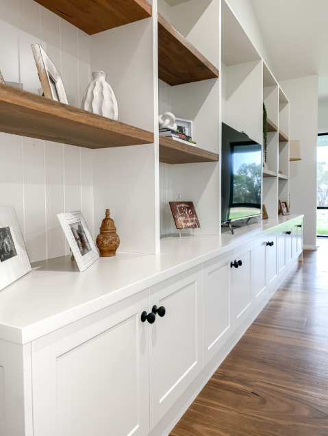 A Living Room With White Cabinets and Wooden Shelves — Kreuzer Cabinets In East Wagga Wagga, NSW