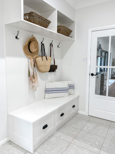 A Hallway With a Bench and Hooks on the Wall — Kreuzer Cabinets In East Wagga Wagga, NSW