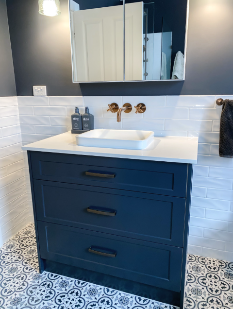 A Bathroom Vanity With a Sink and a Mirror — Kreuzer Cabinets In East Wagga Wagga, NSW