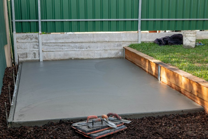 Concreters waiting for a freshly constructed concrete slab to dry in Perth WA.