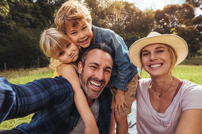Happy Family — Phoenix, AZ — National Health & Wealth Advisors