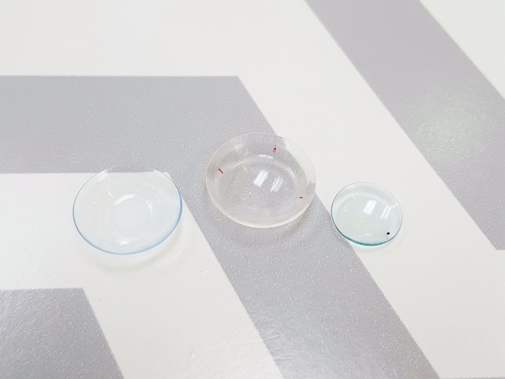 size comparison of a soft contact lens, a scleral contact lens, and a conventional gas permeable lens